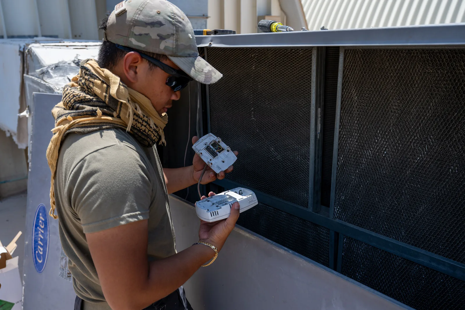 HVAC service technician working on equipment